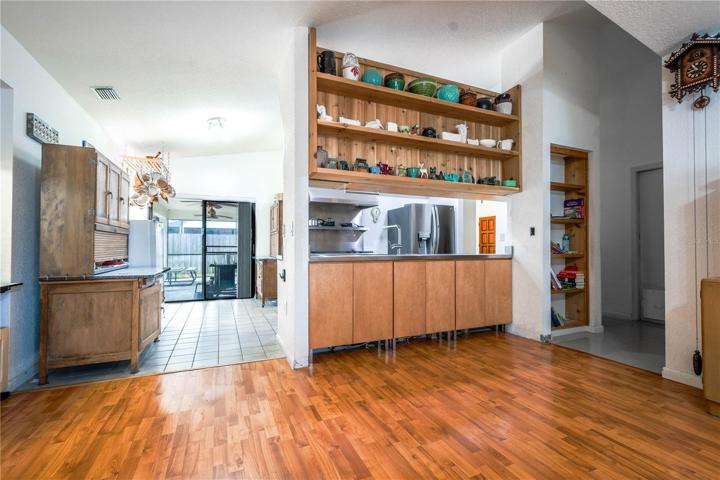 The kitchen is adjacent to the family room.