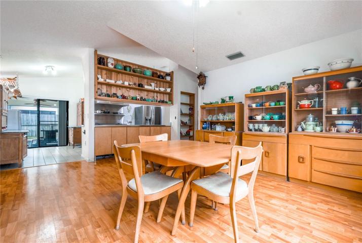 The family room features wood laminate flooring.