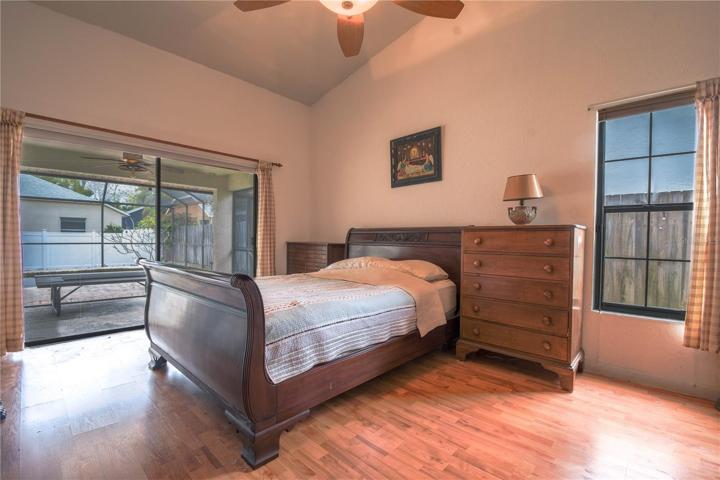 Primary bedroom has vaulted ceilings.
