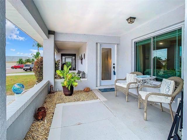 Enjoy time with your neighbors or your morning cup of coffee on this beautiful front porch!