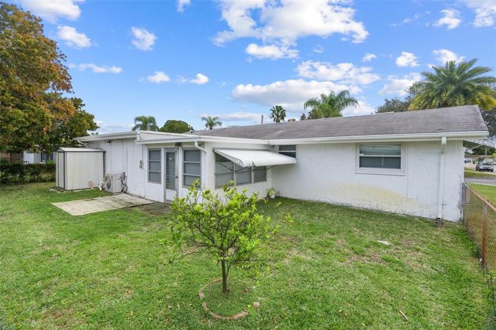 Rear of Home with Fenced Backyard
