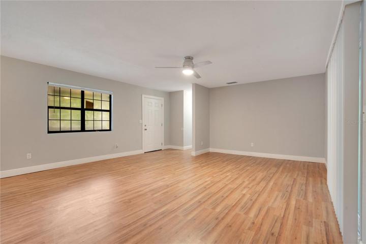 VIEW OF ENTRY TO LIVING ROOM FROM DINING AREA.
