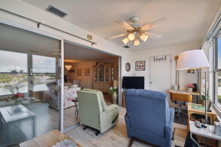 Glass doors separate living and Fl Rm for privacy