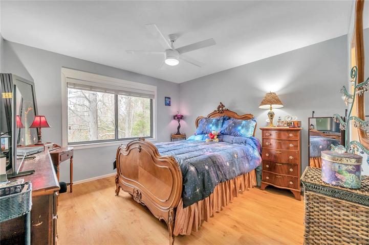Primary Bedroom has a view of the community lake