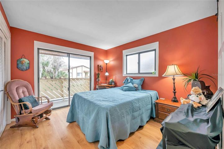 Bedroom 2 with a second balcony can be used as a guest bedroom, office or second living area