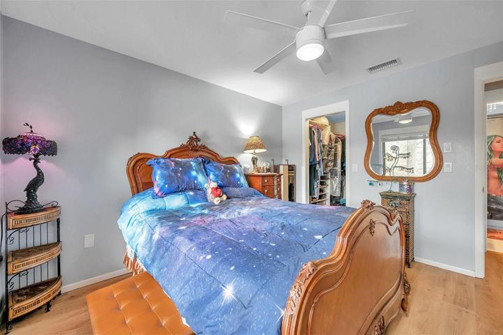 Primary bedroom with walk in closet