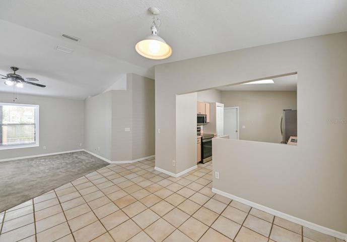 Dining Area Overlooking Kitchen & Living Room