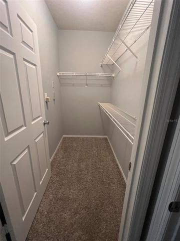 1 of 2 walk in closets in Primary Bedroom