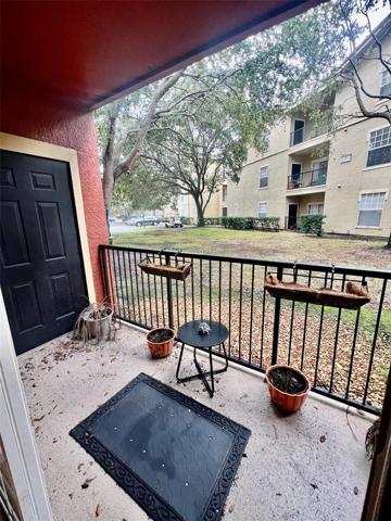 Porch with storage off of dining room