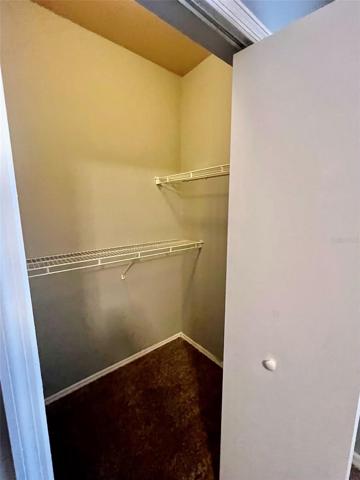 1 of 2 walk in closets in Primary Bedroom