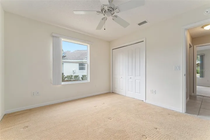 BEDROOM #2 with CLOSET & GUEST WING HALLWAY