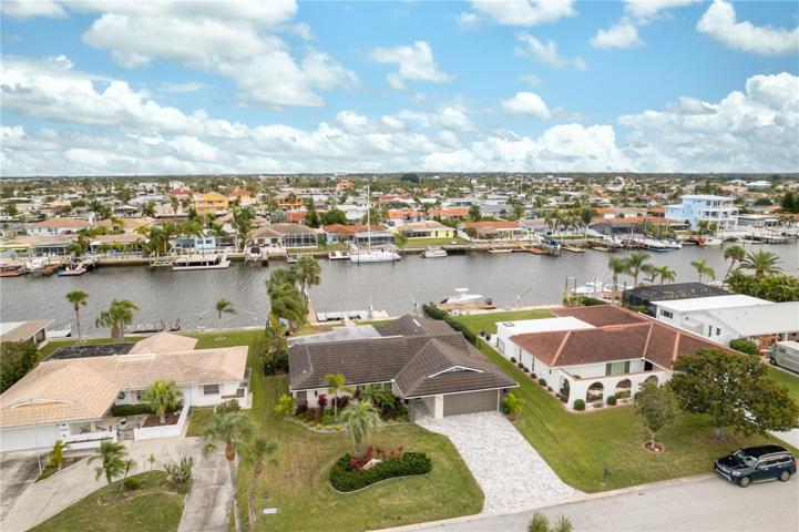 situated on one of the widest canals in the community