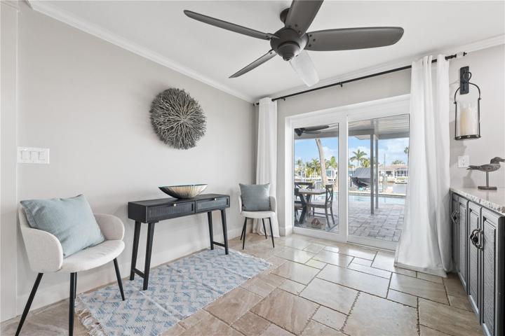 bonus office/sitting space off the kitchen with walkouts to the pool