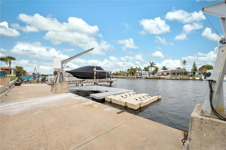 large concrete deck area and easy access to the boats and jet skis