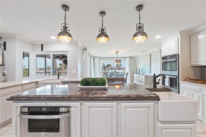built in lower micowave , convenient access on the center island