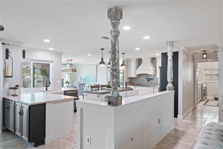 Chefs dream kitchen with hand picked driftwood pillars