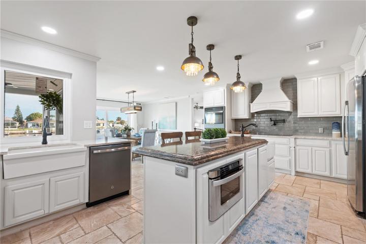 granite and stone counters with built in stainless steel appliances