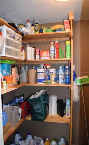 Cleaning/storage room in utility/laundry room