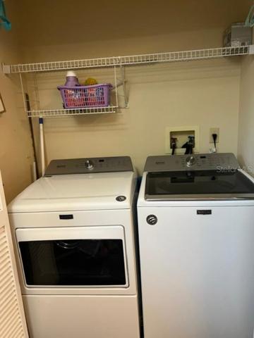 laundry room closet in kitchen