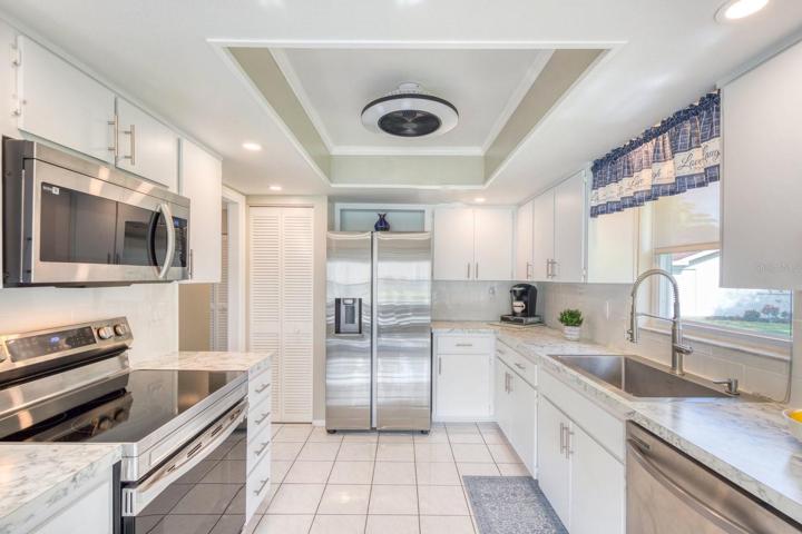 Efficient arrangement with pantry closet & farm sink~