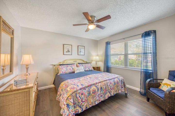 Bedroom 2 at front with en suite & large walk-in/storage closet~