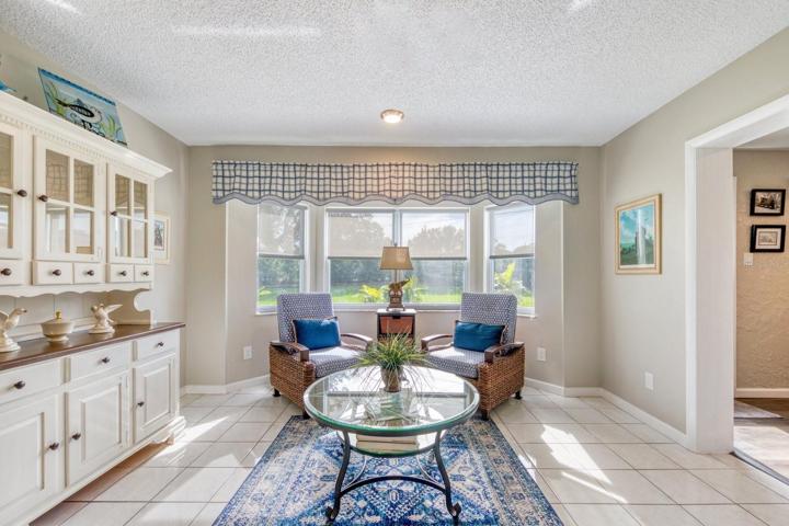 Sunny bay windows with lush backyard landscape view~