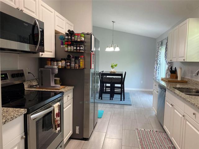 Kitchen looking from the laundry room