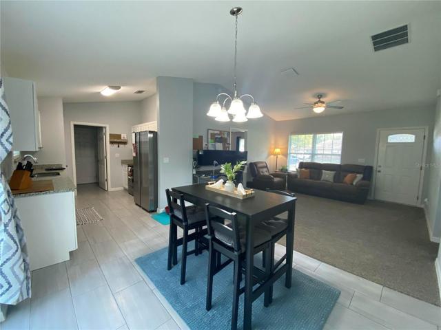 Corner view of the dining, kitchen, and living room