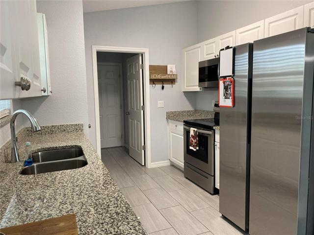 Kitchen with granite counters