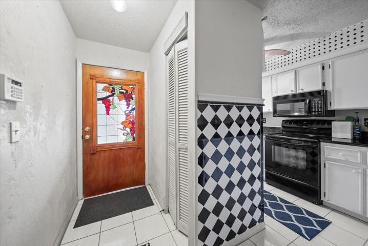 Front Door and Kitchen View