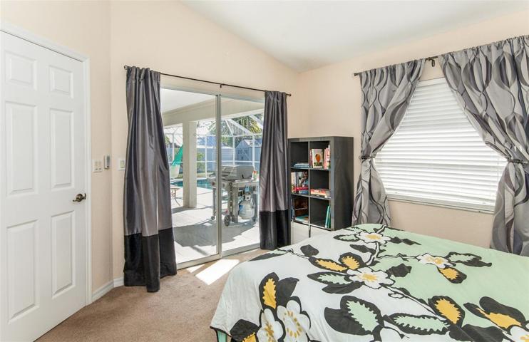 Guest Bedroom 3 Offers Access to Covered Lanai