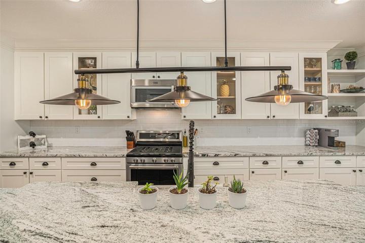 Tastefully updated kitchen-quartz counters
