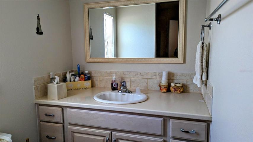 Primary bath has tub shower combo