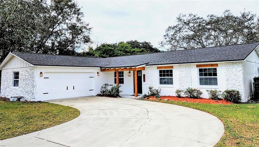 Welcome to 3208 This homes exterior is exquisite with its all new windows and a Brand new Charcoal roof.
