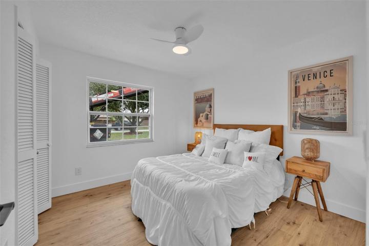 The second bedroom has a huge window that lets in lots of light.