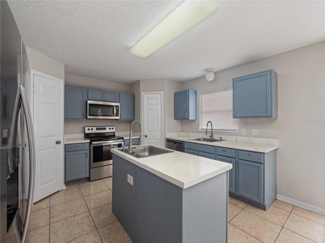 Kitchen with island with lots of cabinet storage