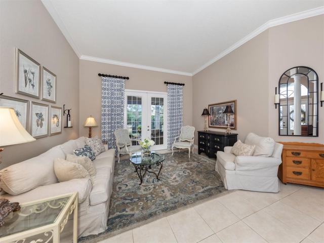 Living room with French doors leading to lanai