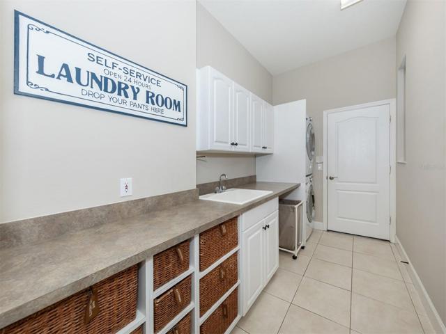 Laundry room with door that opens to 3.5 garage