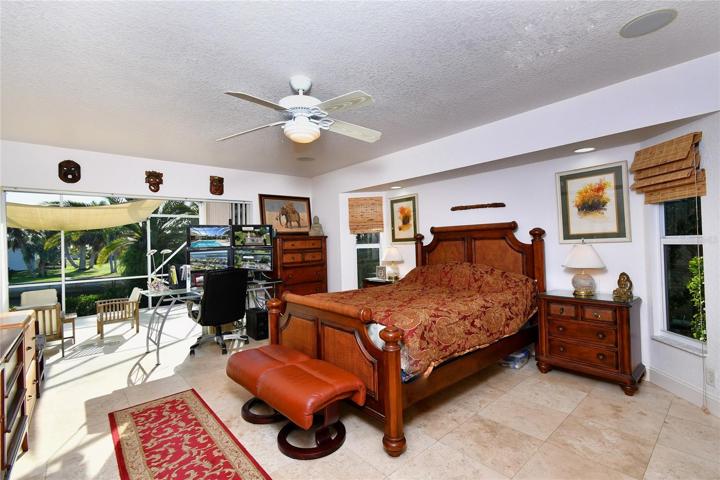 Primary bedroom with step out to the private extended lanai