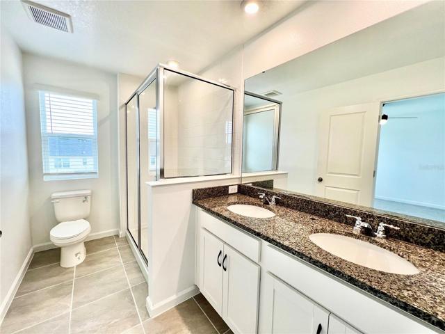 Owner's Bathroom with dual sinks