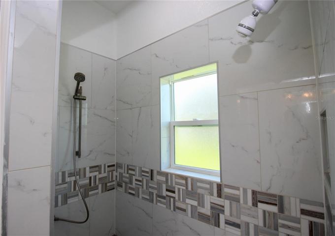 Primary bath shower with double shower heads