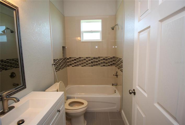 Bathroom with tile floor