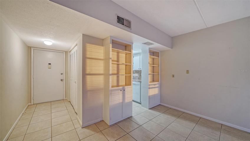 front door and kitchen