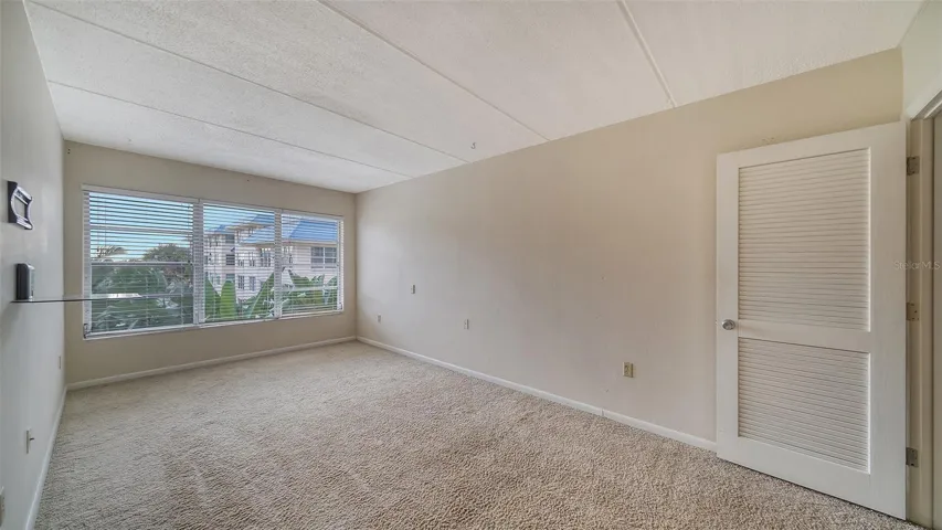 another view of primary bedroom, gulf views