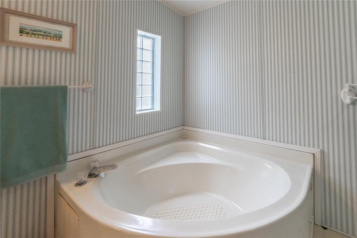 Primary ensuite bathroom sunken tub