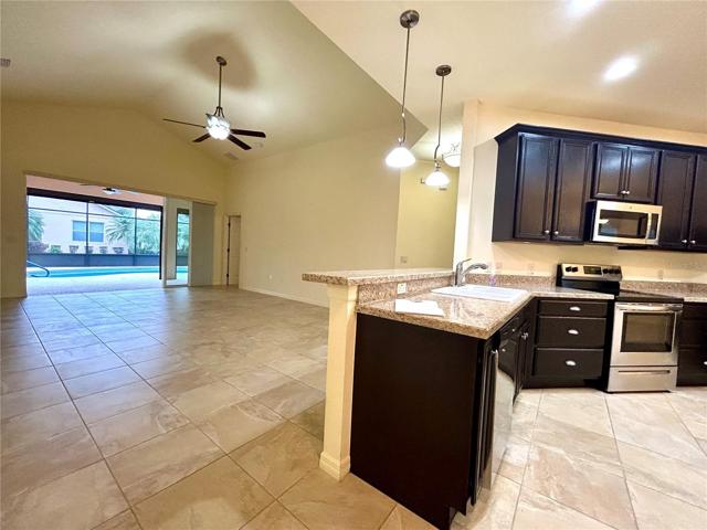 view from kitchen bar to living room