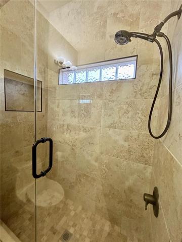guest bathroom with huge walk in shower
