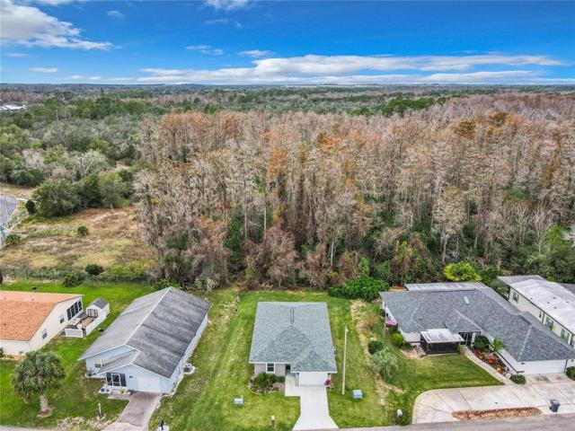 Located on an oversized lot at 55+ community Nature's Edge
