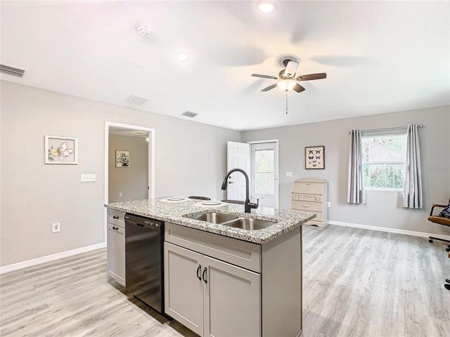 Luxury vinyl plank flooring throughout