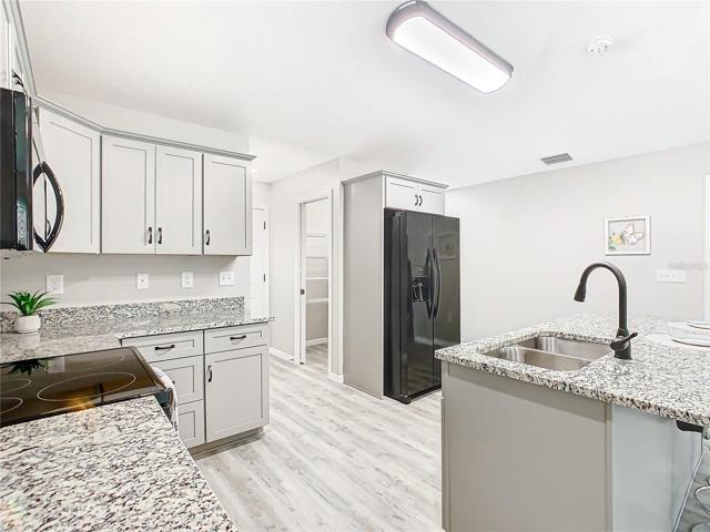 The kitchen has a large walk in pantry as well